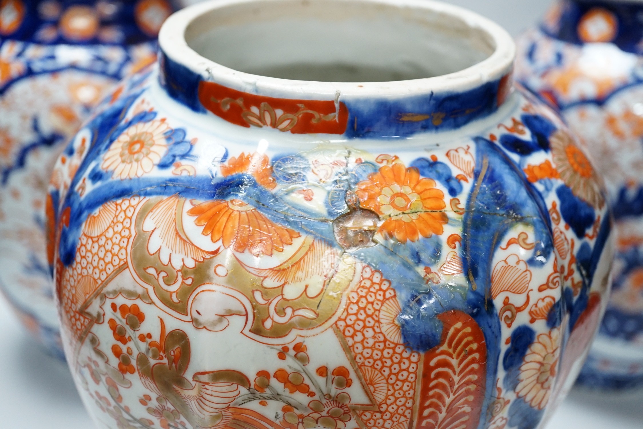 Three large Imari vases, tallest 28.5cm